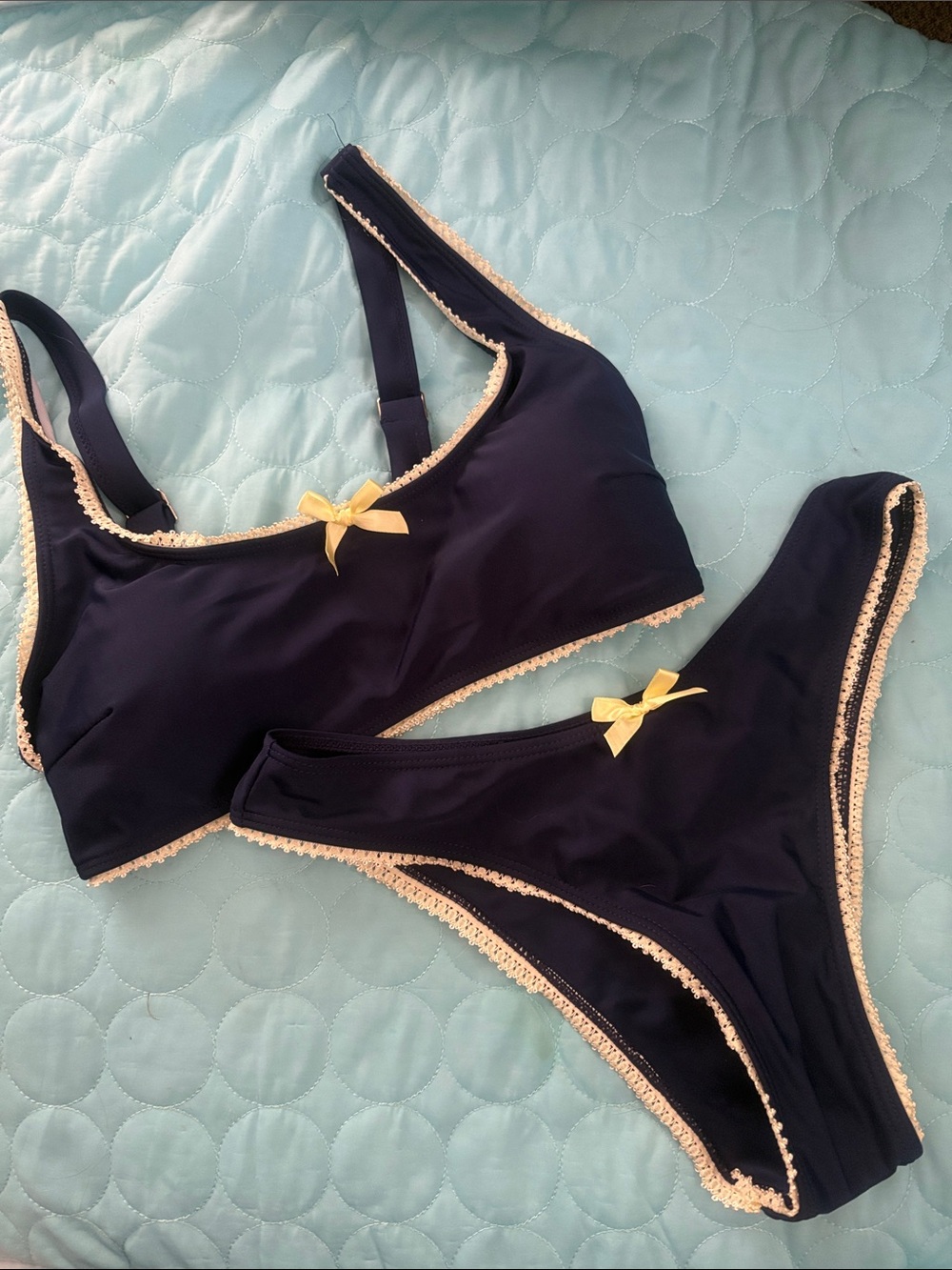 Women’s Navy Blue Bikini Set with Cream Trim and Yellow Bows